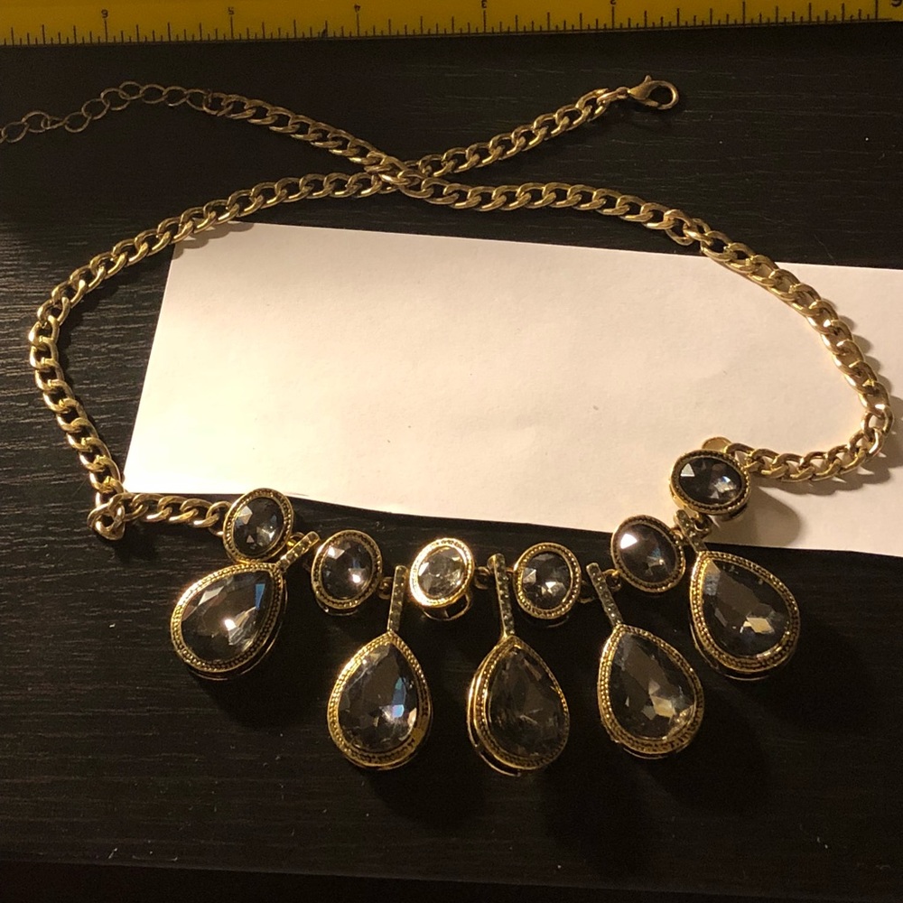 Gray crystal and gold necklace. Costume